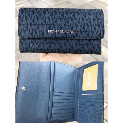 michael kors iphone wallet blue|Michael Kors oversized wallet.